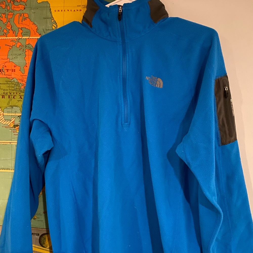 North Face Mens Fleece half zip. Sz L. Fits closer to a medium.